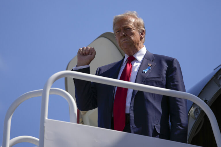 Republican presidential nominee former President Donald Trump arrives in Johnstown, Pa., en route to the Flight 93 Memorial, Wednesday, Sept. 11, 2024. (AP Photo/Matt Rourke)