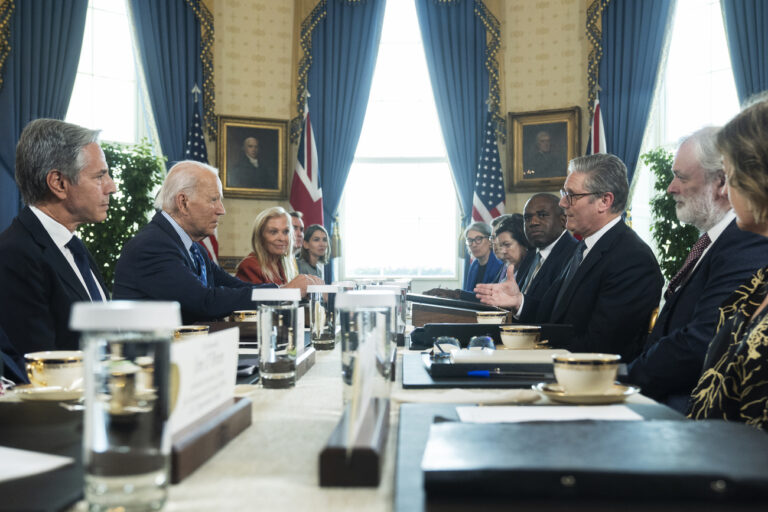 President Joe Biden, second from left, hosts a bilateral meeting with UK Prime Minister Keir Starmer, third from right, in the Blue Room of the White House, Friday, Sept. 13, 2024, in Washington. (AP Photo/Manuel Balce Ceneta)