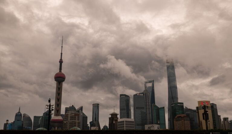 epa11607722 Lujiazui financial district skyline is seen during the heavy wind and rain amid Typhoon Bebinca in Shanghai, China, 16 September 2024. Shanghai, China's financial hub, closed its seaports and canceled over 600 flights in preparation for Typhoon Bebinca, the strongest tropical storm to hit the city in 75 years. More than 377,000 people were evacuated, and the Mid-Autumn Festival's mood has been dampened by the potential for up to 10 inches (25 cm) of rain. EPA/ALEX PLAVEVSKI