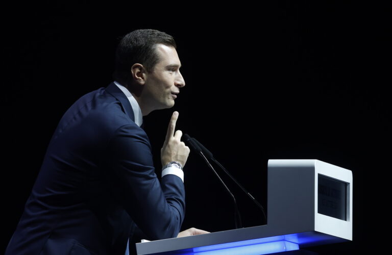 epa11645722 Jordan Bardella, President of the French far-right National Rally party (RN - Rassemblement National in French), delivers a speech during the RN political party meeting in Nice, France, 06 October 2024. EPA/SEBASTIEN NOGIER