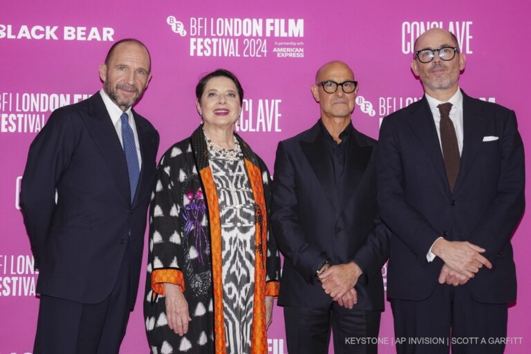 Ralph Fiennes, from left, Isabella Rossellini, Stanley Tucci and director Edward Berger pose for photographers upon arrival at the premiere of the film 'Conclave' during the London Film Festival on Thursday, Oct. 10, 2024, in London. (Photo by Scott A Garfitt/Invision/AP)