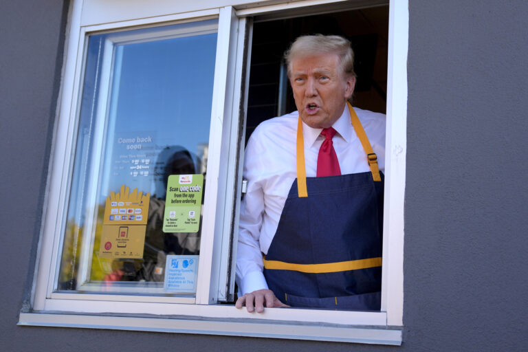 Republican presidential nominee former President Donald Trump speaks from a drive-thru window during a campaign stop at a McDonald's, Sunday, Oct. 20, 2024, in Feasterville-Trevose, Pa. (AP Photo/Evan Vucci)