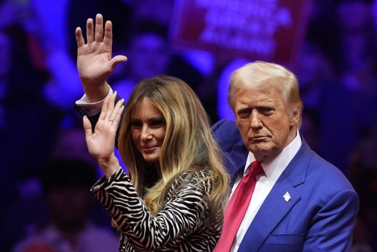 Republican presidential nominee former President Donald Trump and former first lady Melania Trump wave at a campaign rally at Madison Square Garden, Sunday, Oct. 27, 2024, in New York. (AP Photo/Evan Vucci)