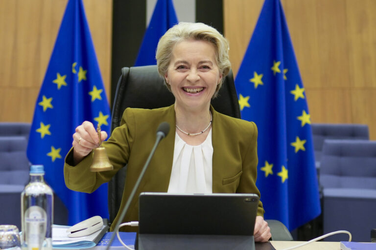 European Commission President Ursula von der Leyen rings a bell to signify the beginning of the weekly college of commissioners meeting at EU headquarters in Brussels on Wednesday, Oct. 30, 2024. (AP Photo/Virginia Mayo)