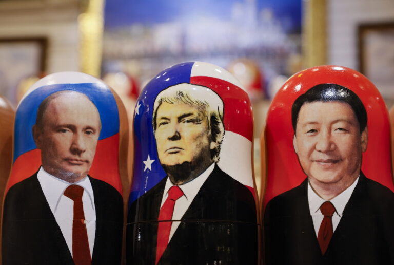 epa11704995 Traditional Russian Matryoshka wooden dolls, also known as nesting dolls, depicting US Republican presidential candidate Donald J. Trump (C), Russian President Vladimir Putin (L) and Chinese President Xi Jinping (R) are on display at a gift shop in Moscow, Russia, 06 November 2024. US Republican presidential candidate Donald J. Trump has been elected the 47th president of the United States after having secured more than the 270 Electoral College votes necessary, following a tightly contested race with Democratic presidential candidate US Vice President Kamala Harris. EPA/YURI KOCHETKOV