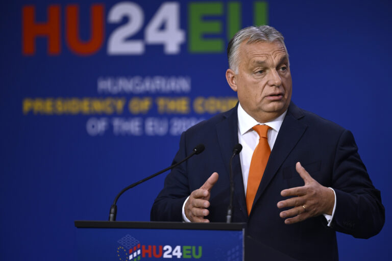 Hungary's Prime Minister Viktor Orban addresses a media conference at the end of an EU Summit at the Puskas Arena in Budapest, Friday, Nov. 8, 2024. (AP Photo/Denes Erdos)