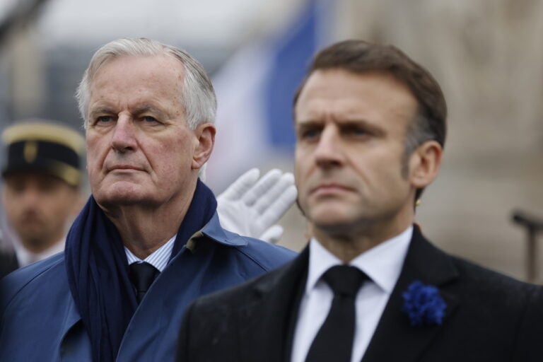 epa11714548 France's President Emmanuel Macron (R) and France's Prime Minister Michel Barnier stand at attention during commemorations marking the 106th anniversary of the WWI Armistice, in Paris, France, 11 November 2024. The Armistice was signed on 11 November 1918 by the Allies and Germany, ending World War I (WWI). EPA/LUDOVIC MARIN / POOL MAXPPP OUT