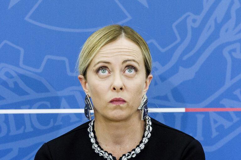 Italian Premier Giorgia Meloni looks up as she meets journalists following a Cabinet meeting in Rome, Thursday, Nov. 28, 2024. (Roberto Monaldo/LaPresse via AP)