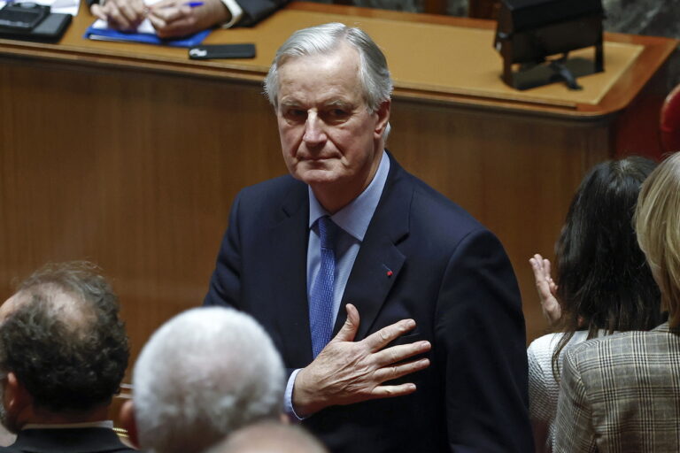 epa11757078 French Prime Minister Michel Barnier gestures after delivering a speech during a no-confidence vote against his government at the National Assembly, in Paris, France, 04 December 2024. The no-confidence vote comes after the French prime minister activated Article 49.3 of the Constitution to pass his social security budget bill without a vote, as a majority of members of Parliament rejected his project on 02 December 2024. EPA/YOAN VALAT