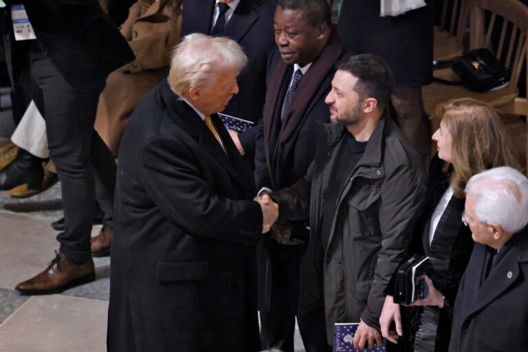 epa11763607 US President-elect Donald J. Trump (C-L) shakes hand with Ukraine's President Volodymyr Zelensky (C-R) inside Notre-Dame Cathedral ahead of a ceremony to mark the re-opening of the landmark cathedral, in Paris, France, 07 December 2024. The Notre Dame de Paris Cathedral reopens on 07 December after nearly six years of renovation work following its destruction by a fire on 15 April 2019. EPA/LUDOVIC MARIN / POOL MAXPPP OUT