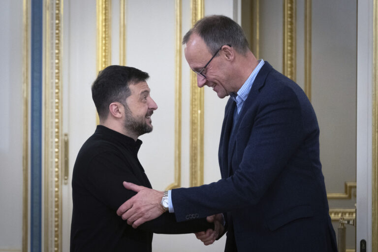 Ukrainian President Volodymyr Zelenskyy, left, and the Chairman of the German Christian Democratic Party (CDU) Friedrich Merz shake hands during their meeting in Kyiv, Ukraine, Monday, Dec. 9, 2024. (AP Photo/Efrem Lukatsky)