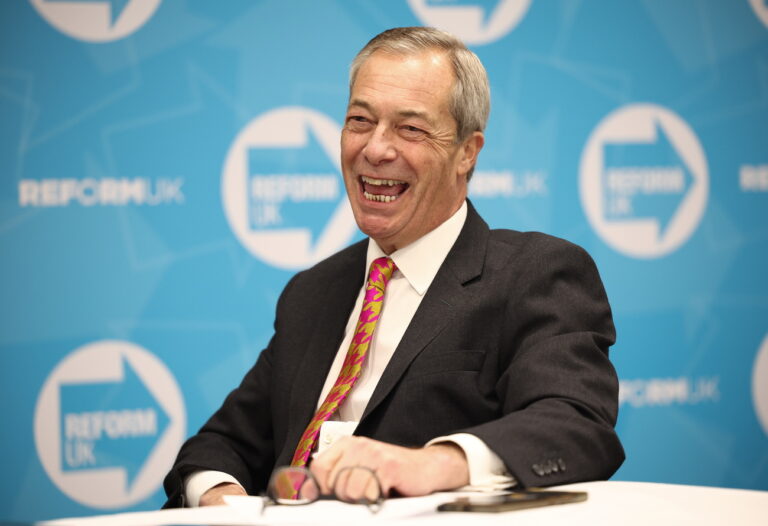 epa11818579 Reform UK Leader Nigel Farage reacts during an interview at the Reform UK North West Conference in Chester, Britain, 11 January 2025. EPA/ADAM VAUGHAN