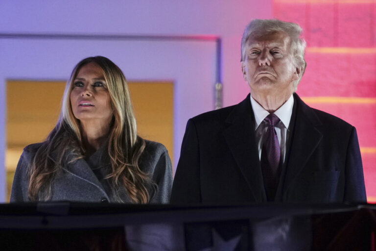 President-elect Donald Trump, right, and Melania Trump watch fireworks at Trump National Golf Club in Sterling, Va., Saturday, Jan. 18, 2025, ahead of the 60th Presidential Inauguration. (AP Photo/Matt Rourke)