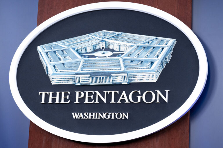 FILE - The Department of Defense logo is seen on the wall in the Press Briefing room at the Pentagon on, Oct. 29, 2024 in Washington. (AP Photo/Kevin Wolf, File)