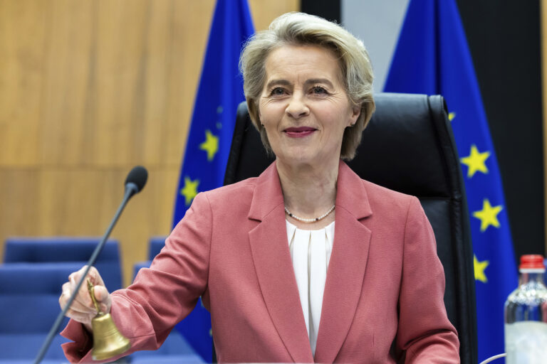 European Commission President Ursula von der Leyen rings a bell to signify the start of the weekly EU College of Commissioners meeting at EU headquarters in Brussels, Wednesday, Jan. 29, 2025. (AP Photo/Geert Vanden Wijngaert)