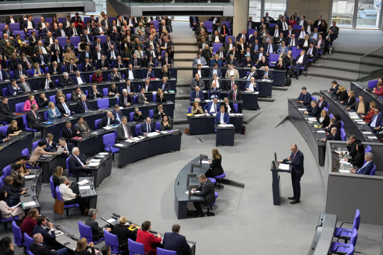 Friedrich Merz, German opposition leader and chairman of the Christian Democratic Union (CDU) party, speaks during a session of the German parliament 'Bundestag' in Berlin, Germany, Friday, Jan. 31, 2025. (AP Photo/Ebrahim Noroozi)