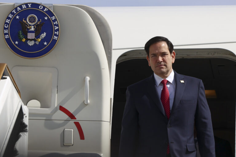 U.S. Secretary of State Marco Rubio disembarks from an aircraft, in Abu Dhabi, United Arab Emirates, Wednesday, Feb. 19, 2025. (Evelyn Hockstein/Pool Photo via AP)