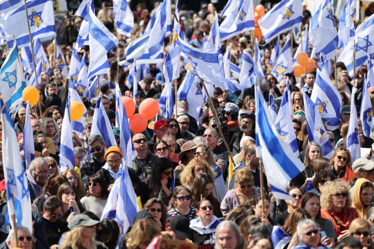 epa11925189 epa11925078 People gather at Hostages Square to watch a live stream of the funeral of the Bibas family, in Tel Aviv, Israel, 26 February 2025. The bodies of four Israeli hostages, including those of Shiri Bibas and her young sons Ariel and Kfir, were returned to Israel on 20 February as part of the ongoing Gaza ceasefire deal between Israel and Hamas. Thousands of people escorted a convoy carrying the family's coffins for the burial ceremony to take place on the Israeli-Gaza border. EPA/ABIR SULTAN EPA-EFE/ABIR SULTAN