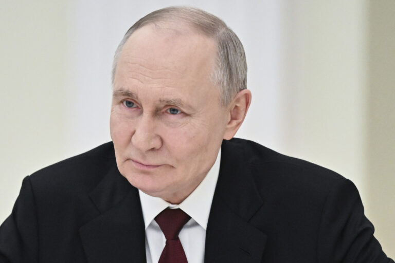 Russian President Vladimir Putin listens to the member of the Politburo of the Central Committee of the Workers' Party of North Korea (WPK), Secretary of the WPK Central Committee Ri Hi-yong during their meeting at the Kremlin in Moscow, Russia, Thursday, Feb. 27, 2025. (Sergei Bobylev, Sputnik, Kremlin Pool Photo via AP)