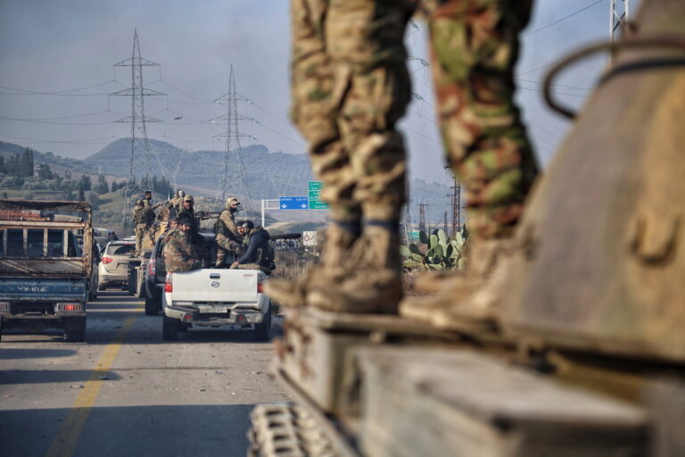 epa11947059 Syrian security forces with heavy weapons take part in an operation following attacks carried out against Syrian security forces, in Latakia, Syria, 07 March 2025. At least 16 Syrian security officers were killed by supporters of former president Bashar al-Assad on 06 March in the coastal province of Latakia, Syrian security forces said.. EPA/BILAL AL HAMMOUD