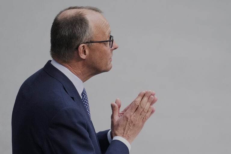 German opposition leader and Christian Democratic Union party chairman Friedrich Merz delivers his speech during a meeting of the German federal parliament, Bundestag, at the Reichstag building in Berlin, Germany, Thursday, March 13, 2025. (AP Photo/Ebrahim Noroozi)