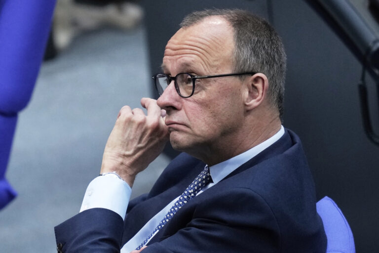 German opposition leader and Christian Democratic Union party chairman Friedrich Merz attend a meeting of the German federal parliament, Bundestag, at the Reichstag building in Berlin, Germany, Thursday, March 13, 2025. (AP Photo/Ebrahim Noroozi)