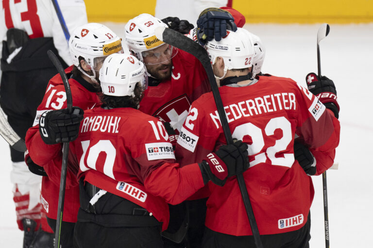 Switzerland?s player celebrate their first goal during the Ice Hockey World Championship semi final match between Switzerland and Canada in Prague at the O2 Arena, Czech Republic, on Saturday, May 25, 2024. (KEYSTONE/Peter Schneider)
