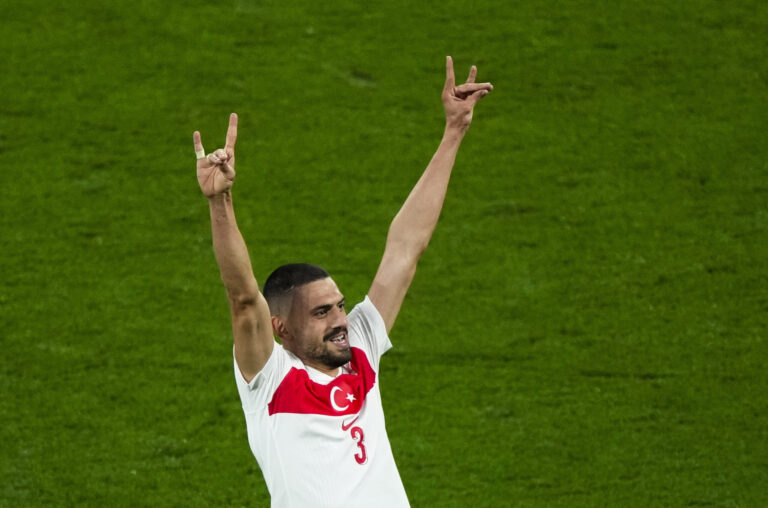 Turkey's Merih Demiral celebrates after scoring his side second goal during a round of sixteen match between Austria and Turkey at the Euro 2024 soccer tournament in Leipzig, Germany, Tuesday, July 2, 2024. UEFA has launched an investigation into Turkey soccer player Merih Demiral's “alleged inappropriate behavior” after he celebrated a goal at Euro 2024 by displaying a hand sign associated with an ultra-nationalist group. (AP Photo/Ebrahim Noroozi)