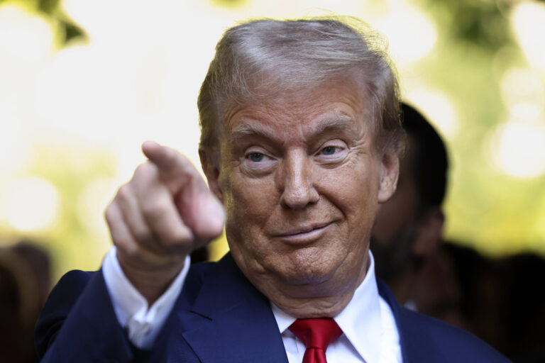 Republican presidential nominee former President Donald Trump motions while attending the 9/11 Memorial ceremony on the 23rd anniversary of the Sept. 11, 2001 terror attacks, Wednesday, Sept. 11, 2024, in New York. (AP Photo/Yuki Iwamura)