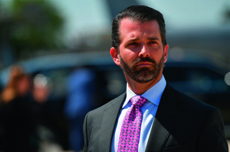 Donald Trump, Jr. looks on upon arrival at General Mitchell International Airport, with  US President Donald Trump, in Milwaukee, Wisconsin on July 12, 2019. - Trump will be in Milwaukee to visit an aerospace company and attend a fundraiser. (Photo by MANDEL NGAN / AFP) (Photo by MANDEL NGAN/AFP via Getty Images)