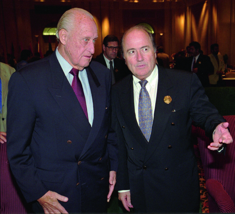 Outgoing FIFA President Joao Havelange, left, talks with FIFA Secretary-General and presidential candidate Joseph Blatter after the 18th Asian Football Confederation Congress in Kuala Lumpur Thursday May 14, 1998. Blatter is contesting for Havelange's post at the FIFA election in Paris on June 8, 1998 with UEFA President, Lennart Johansson of of Sweden.(AP Photo/S.Thinakaran)