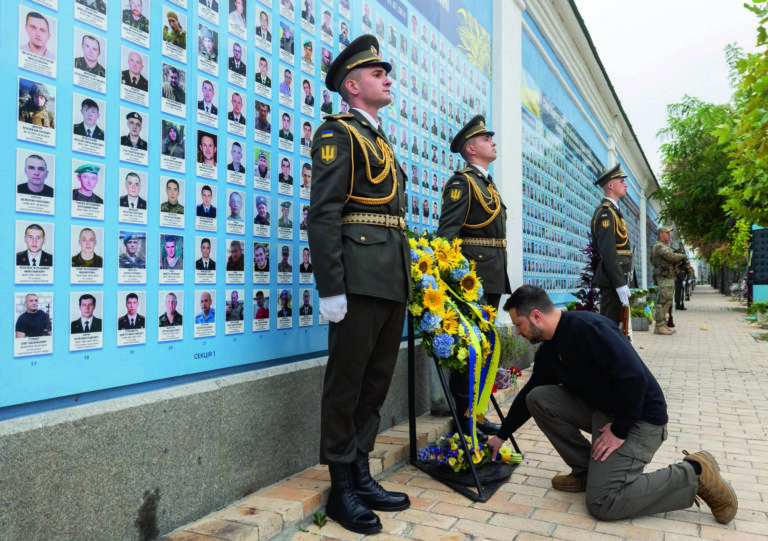 epa10893832 A handout photo made available by Presidential Press Service shows Ukrainian President Volodymyr Zelensky (R) attends a ceremony to honor the memory of Ukrainian soldiers who gave their lives defending their Motherland near the Memory wall of fallen defenders of Ukraine in Russian-Ukrainian war in downtown Kyiv, Ukraine, 01 October 2023. Ukrainians mark on 01 October 2023 three different celebrations: the Day of Defenders of Ukraine, the Day of the Ukrainian Cossacks and the Feast of the Intercession of the Holy Mother of God. EPA/PRESIDENTIAL PRESS SERVICE / HANDOUT HANDOUT EDITORIAL USE ONLY/NO SALES
